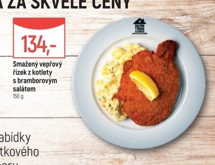 Smažený vepřový řízek z kotlety s bramborovým salátem