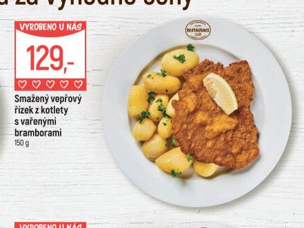 Smažený vepřový řízek z kotlety s vařenými bramborami